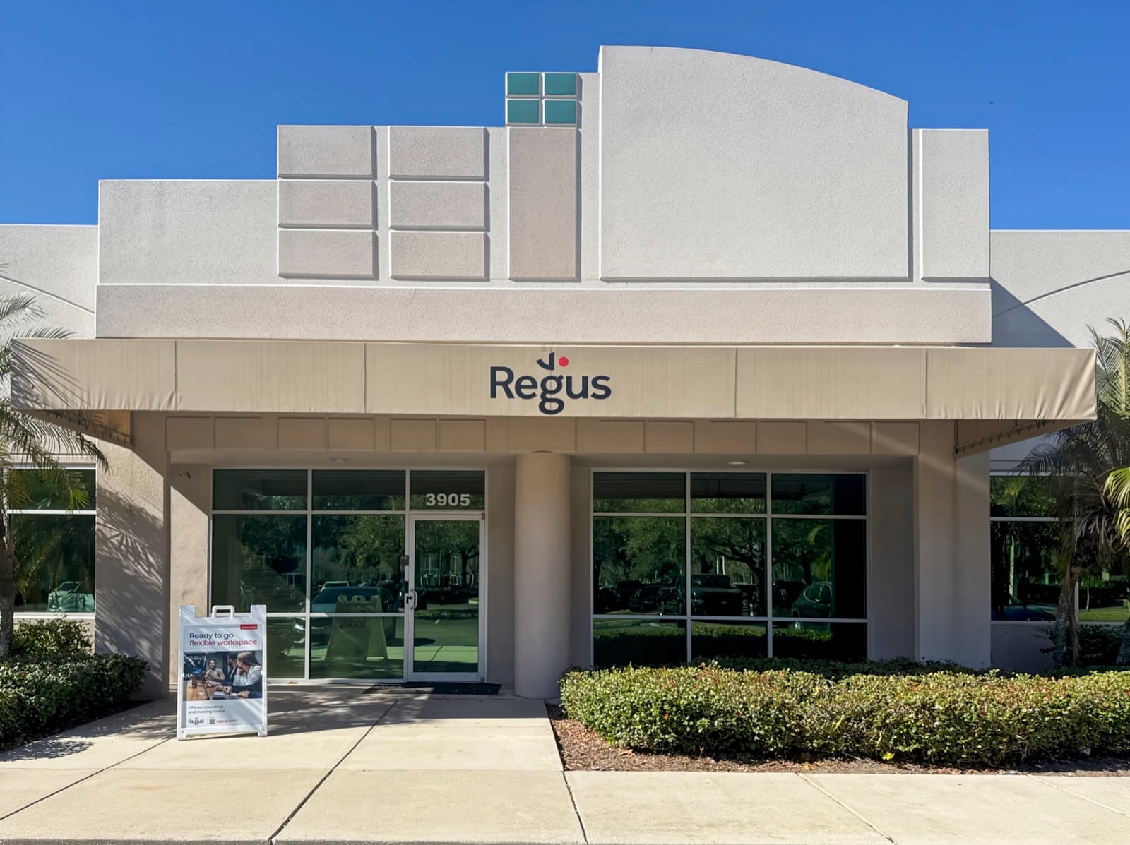 Front entrance of 3905 Crescent Park Dr, Riverview, with the Regus sign above the glass doors